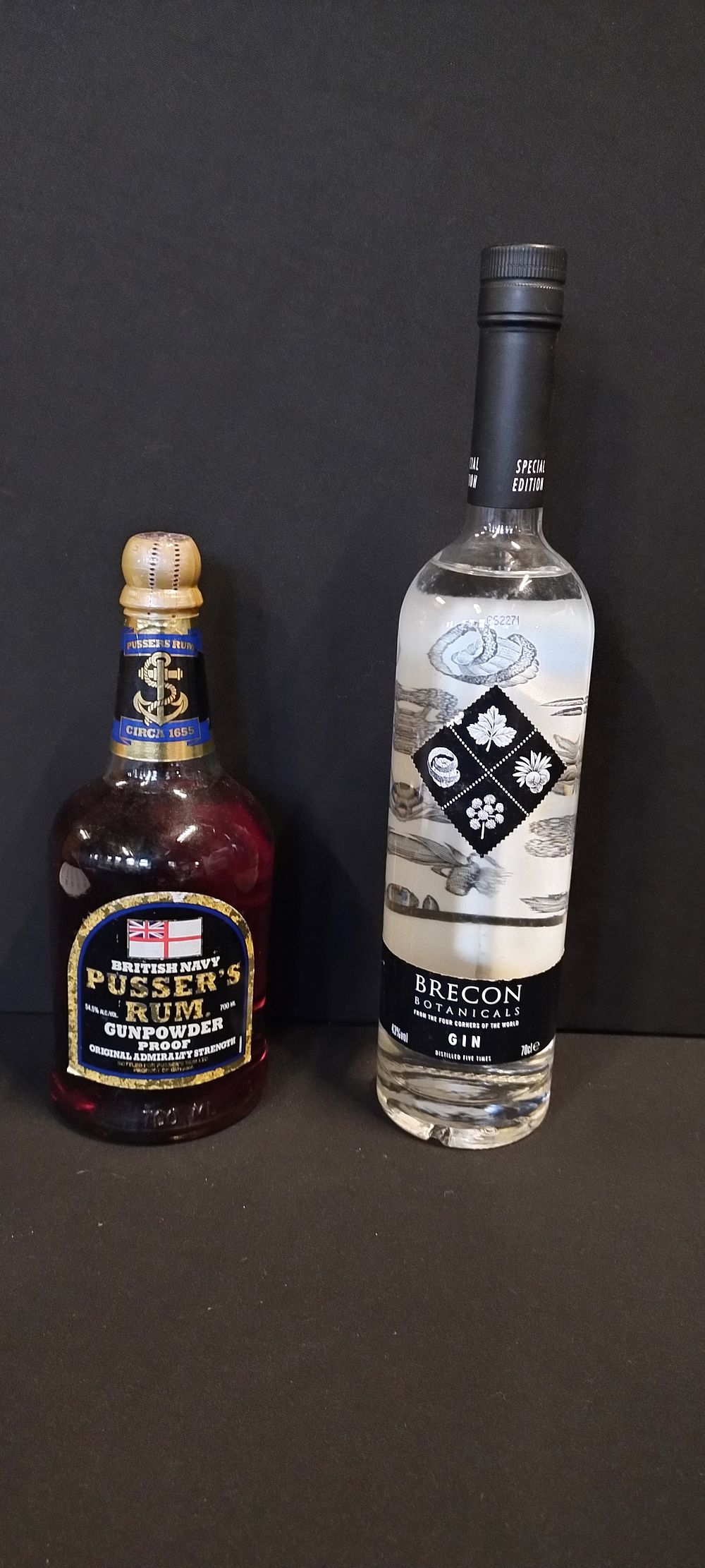 Lot 201: Two unopened bottles of alcohol, a bottle of...
