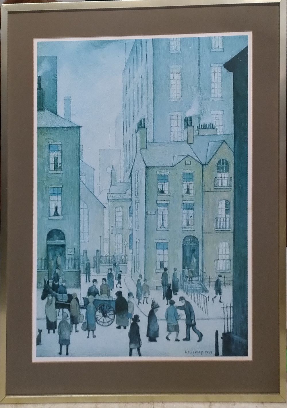 Lot 202: Framed L.S. Lowry print of Hawkers Cart. Measures...