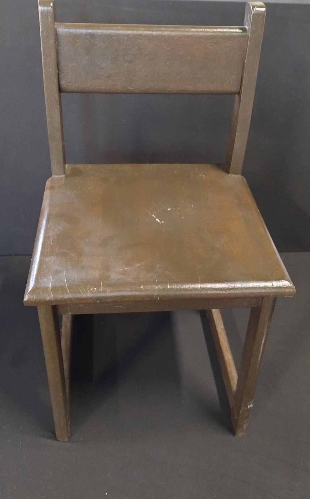 Lot 203: Small dark wood child's chair. Measures approx H...