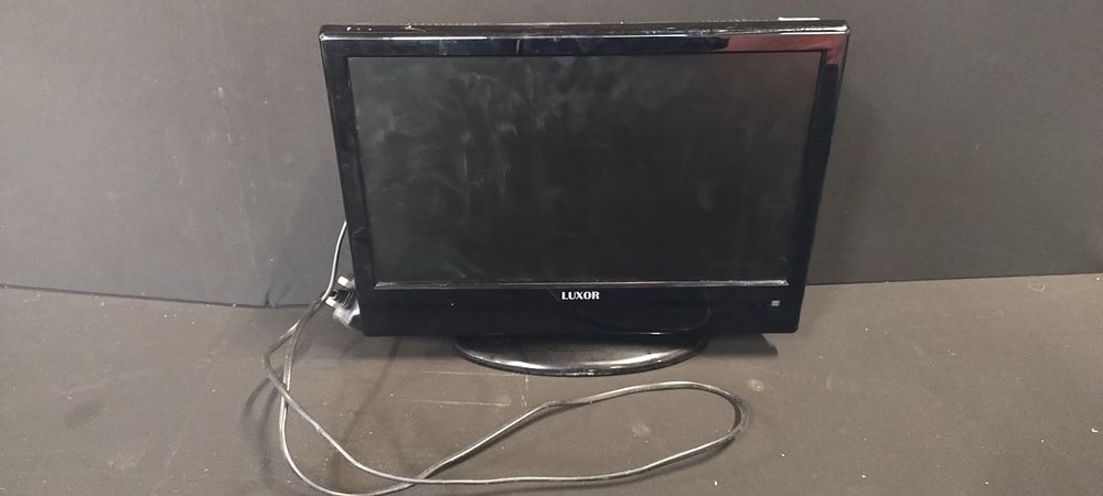 Lot 208: Luxor 16 in tv with built in dvd...