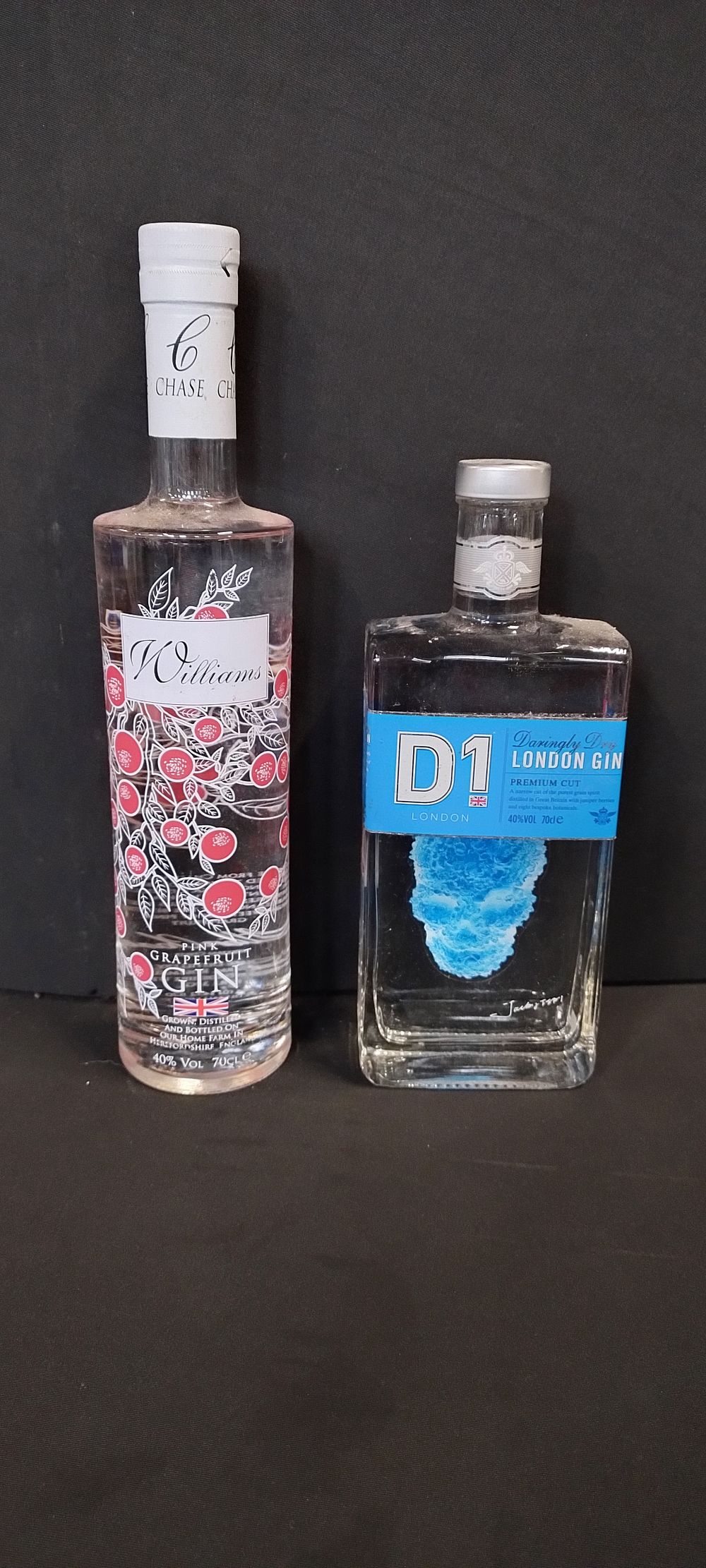 Lot 223: Two bottles of unopened gin, Williams Pink grapefruit...