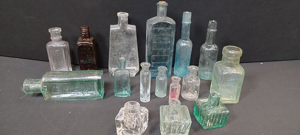Lot 232: Selection of vintage bottles including Hewitts Causeous fluid,...