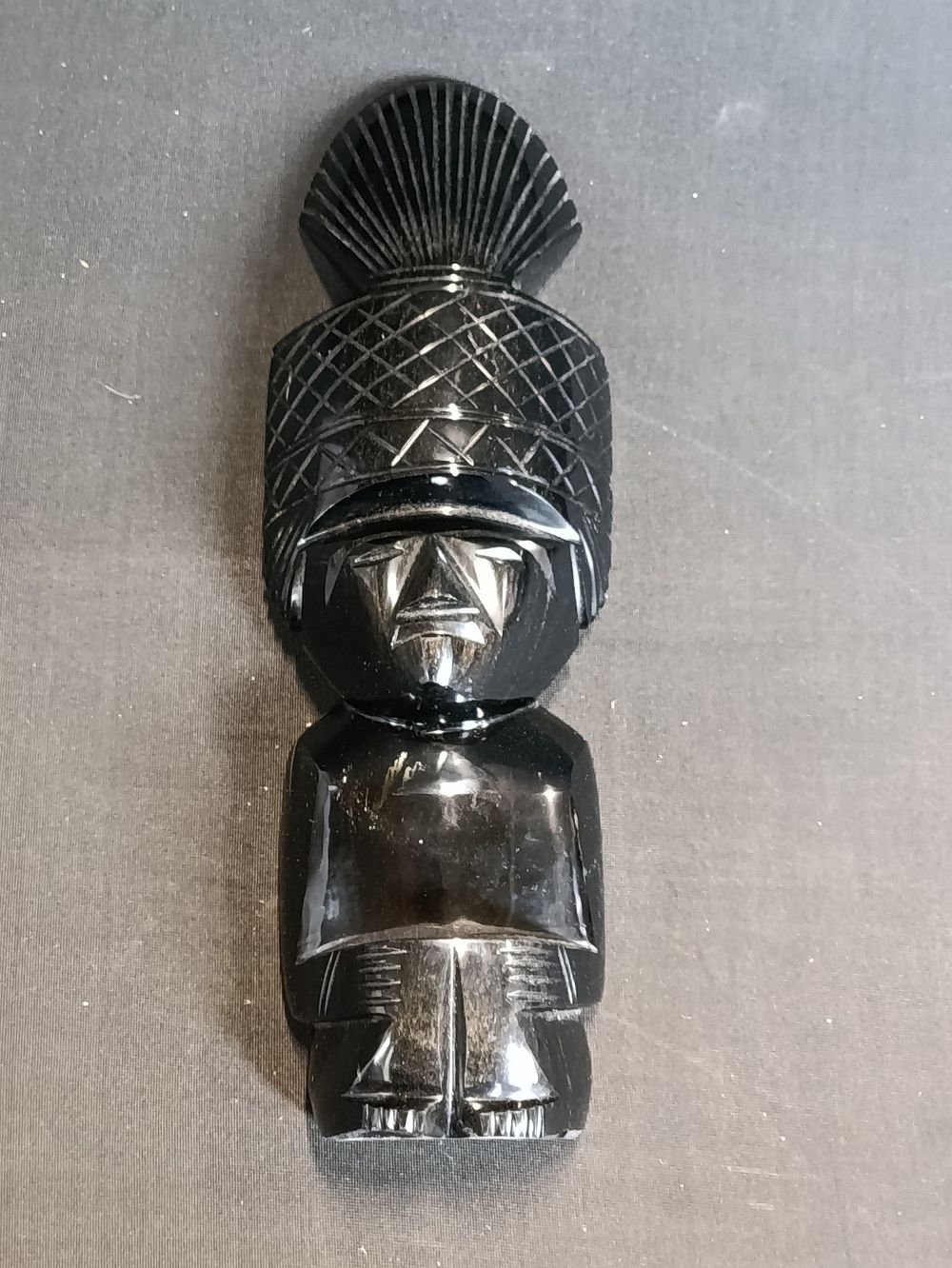 Lot 233: Black glass Aztec figure approximately 30cm in length
