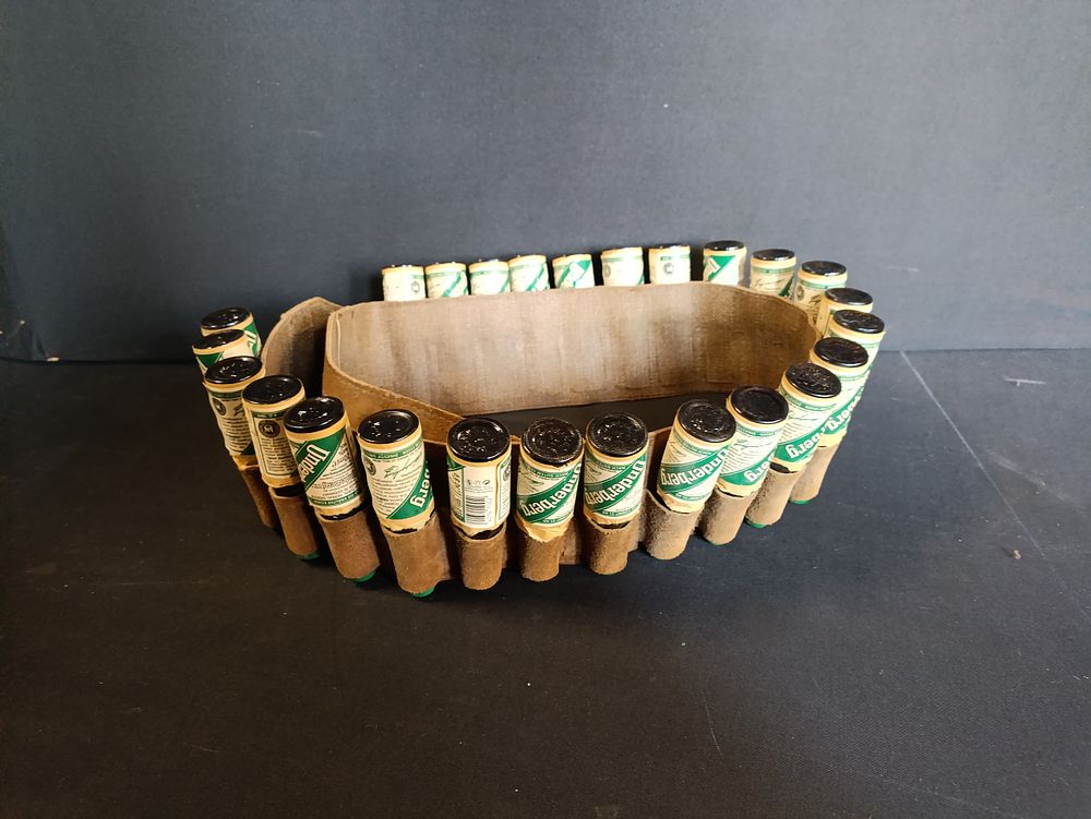 Lot 265: Vintage Underberg shot Bandolier belt carrier with empty...
