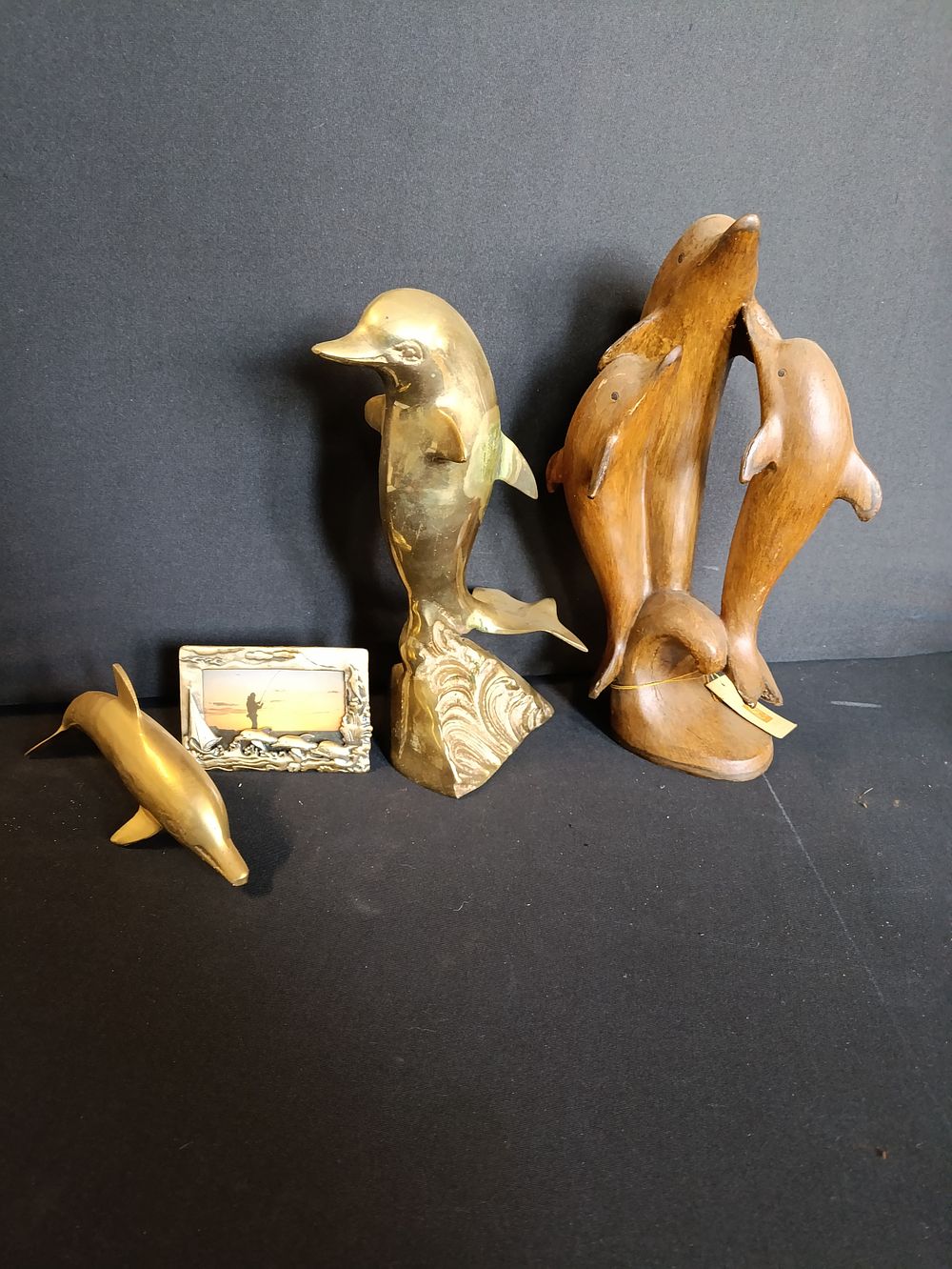 Lot 270: Selection of Dolphin ornaments including two brass figurines,...