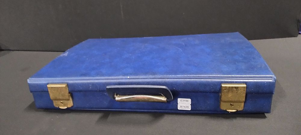 Lot 292: Cassette tape carry case includes 60 various artists...