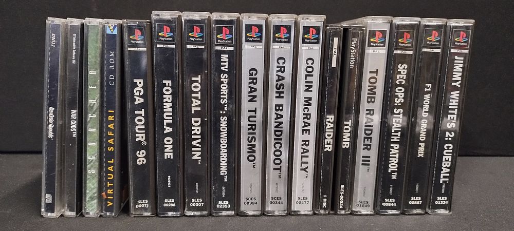 Lot 311: 12 playstation 1 games and some pc cd...