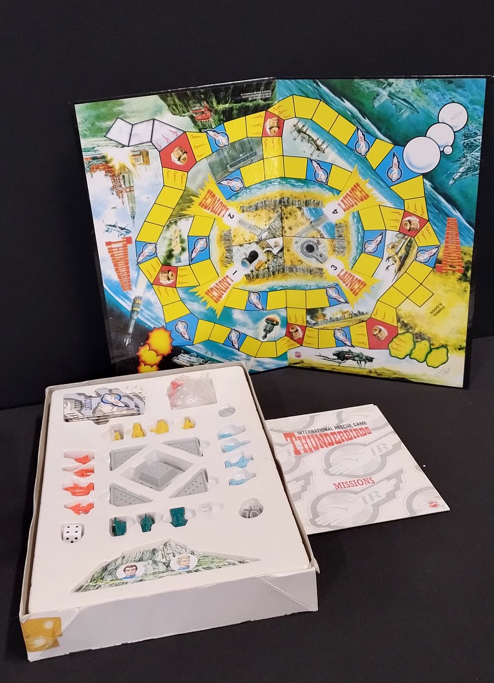 Lot 325: Peter Pan playthings. Thunderbirds International Rescue Game.
