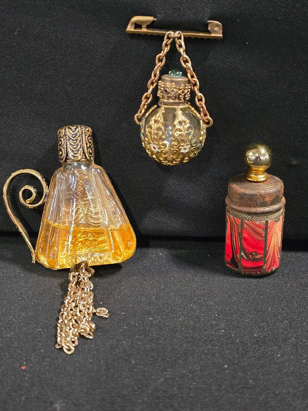 Lot 370: Three antique and vintage mini perfume bottle brooches...