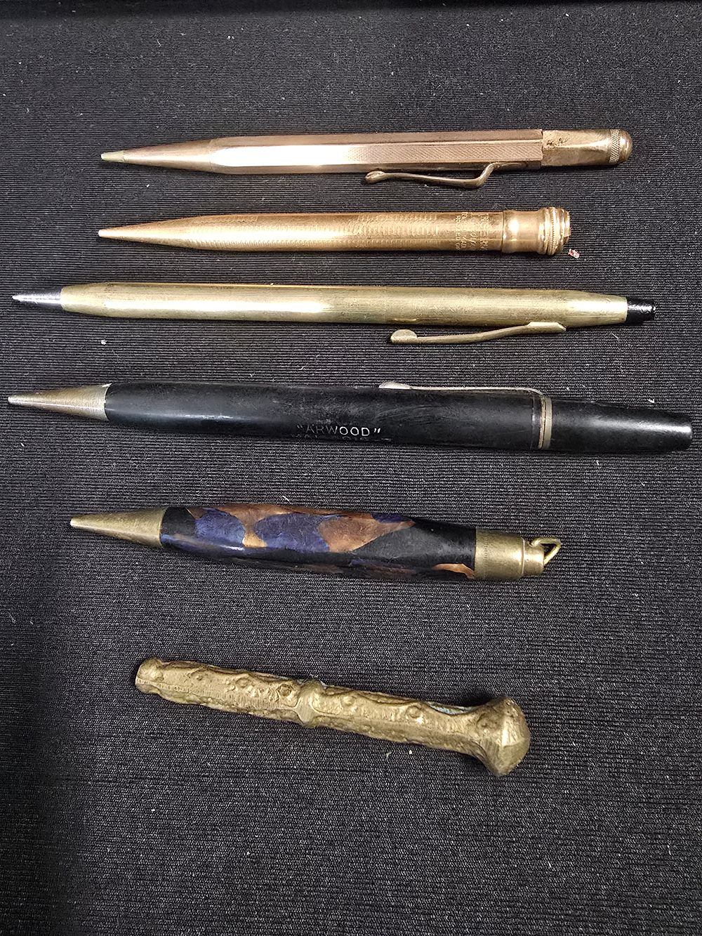 Lot 371: A collection of vintage push pencils. Includes Ingersol...