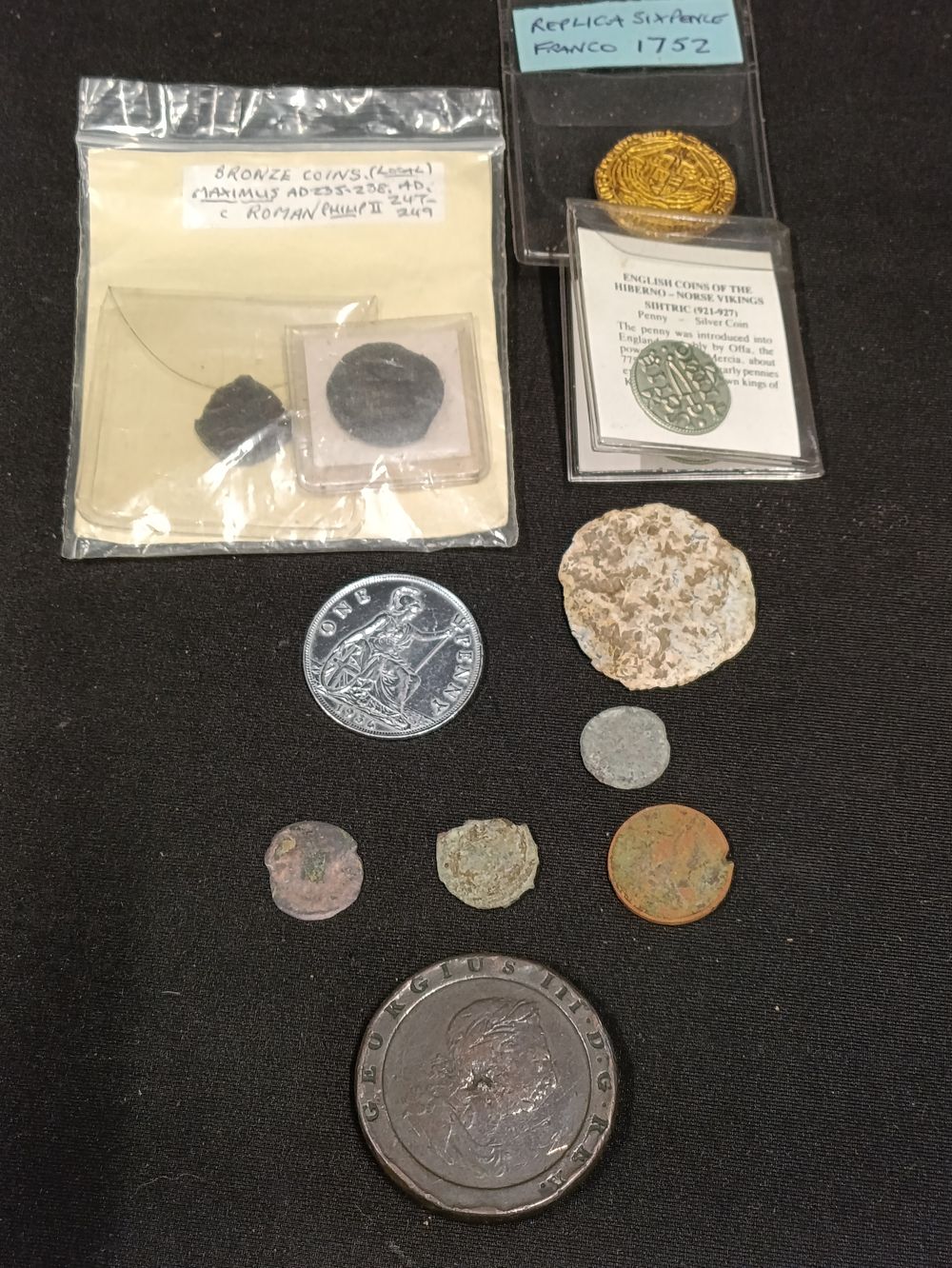 Lot 383: Collection of historic coins including a 1797 cartwheel...