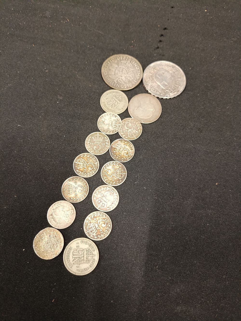 Lot 393: Collection of 16 sterling silver coins including 1949...