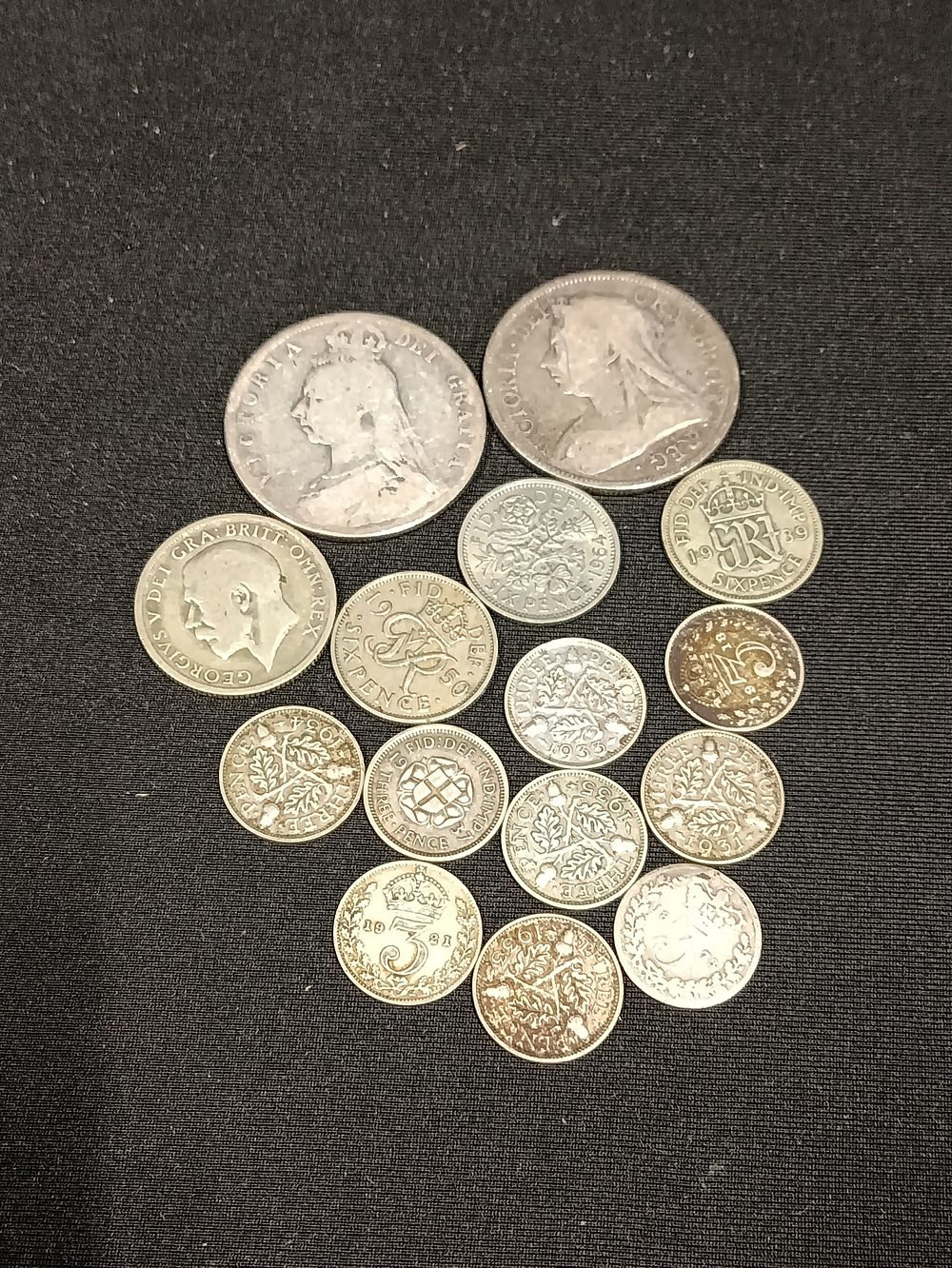 Lot 410: Collection of 15 sterling silver coins including an...