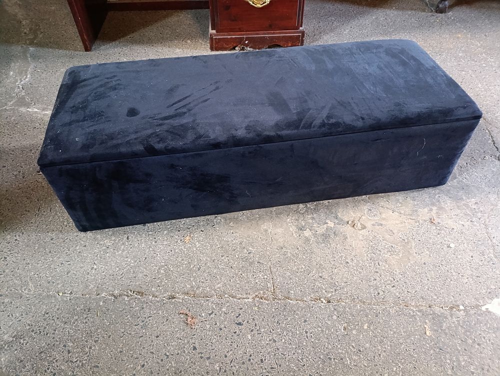 Lot 408: Black suede ottoman with detachable legs