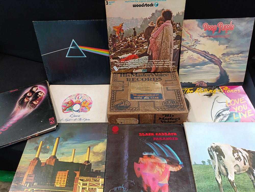 Lot 409: Collection of 11 Rock Vinyl Records along with...
