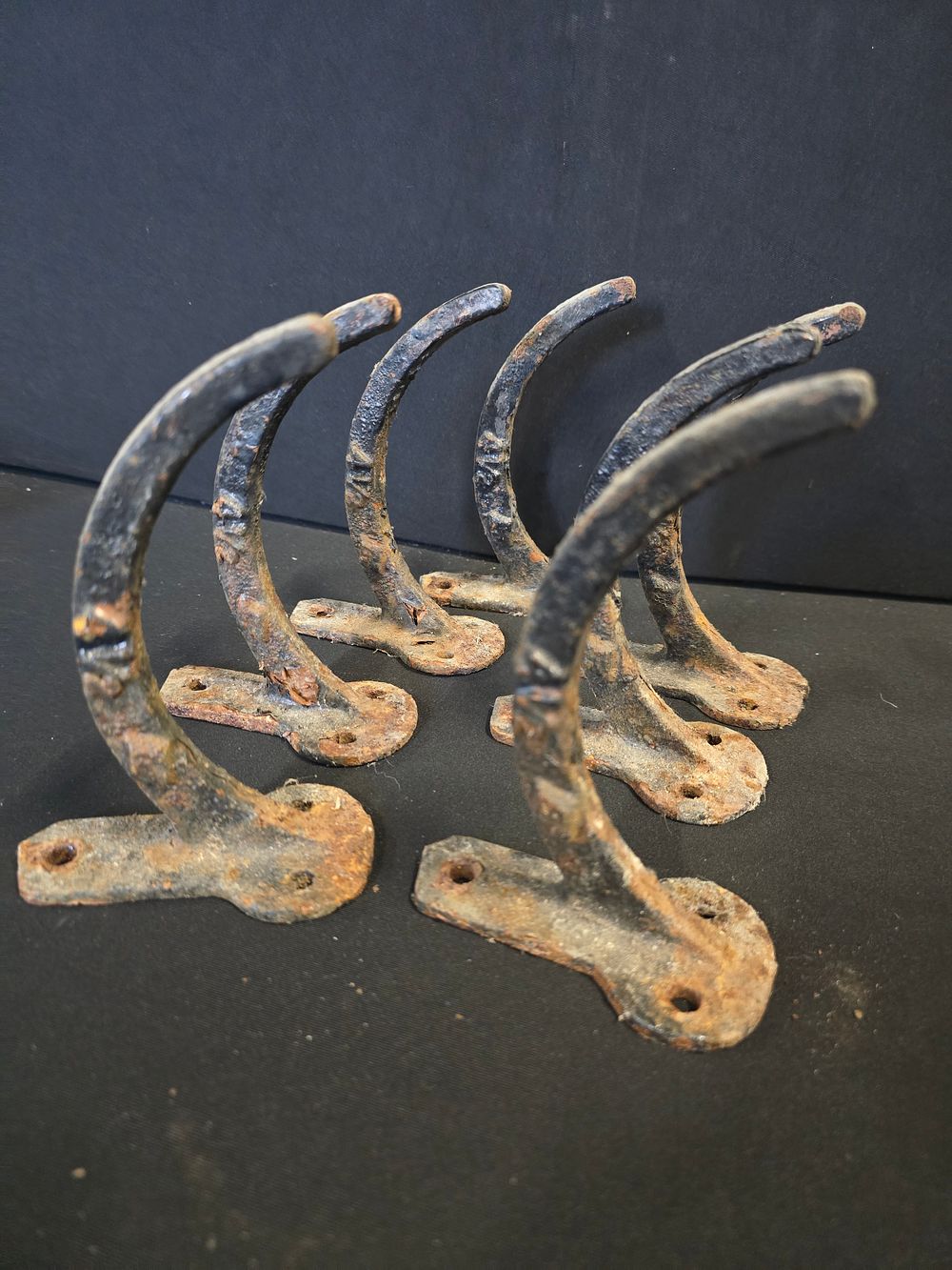 Lot 425: Seven cast iron Bail hooks