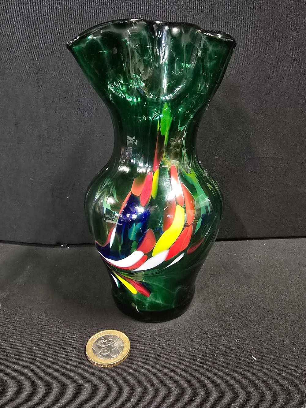 Lot 434: A green glass Lafiore multi coloured fleck vase....