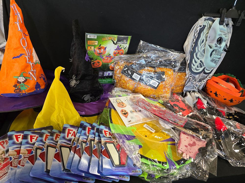 Lot 461: A collection of Halloween items includes. 8, 3...