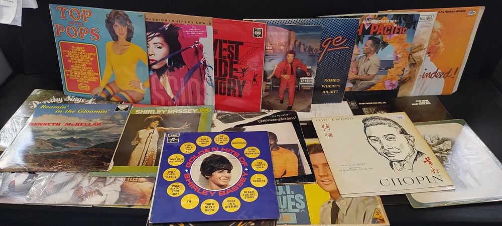 Lot 498: Selection of vinyl albums including Wham, Simon and...