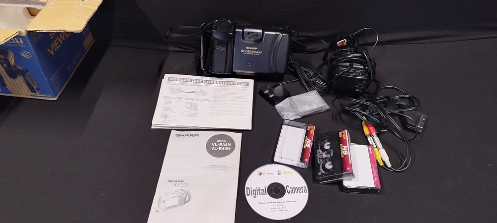 Lot 510: Sharp viewcam VL-E34 and accessories, battery and leads