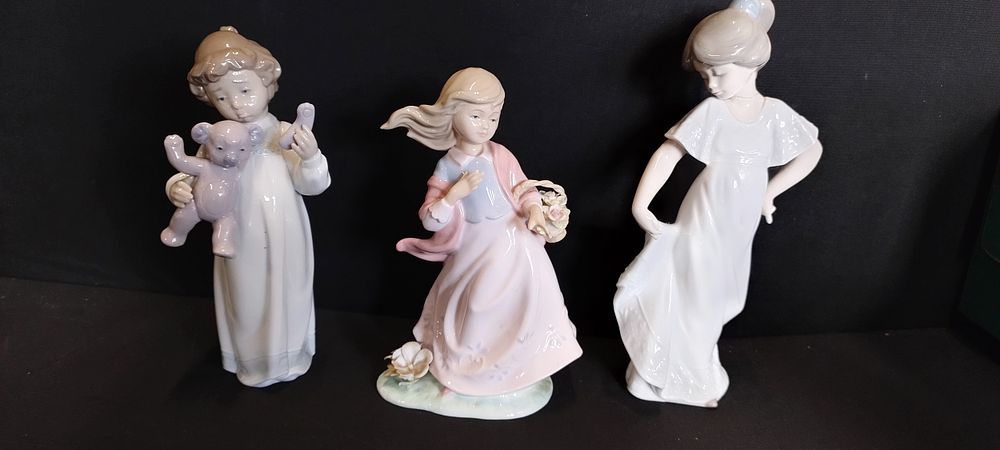 Lot 441: Three NAO figurines. How Pretty, Springtime Girl, and...