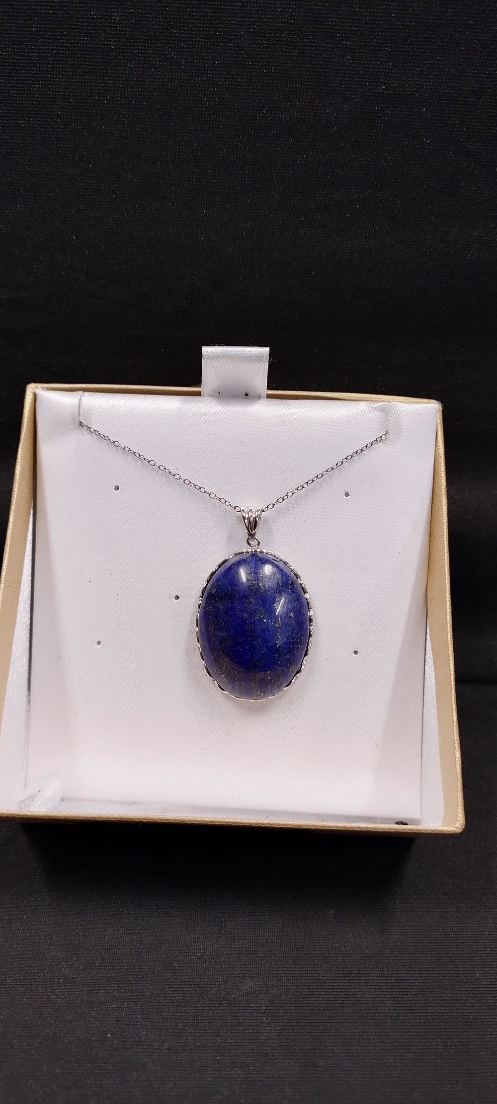 Lot 452: Sterling silver cabochon lapis luzli pendant on chain,...