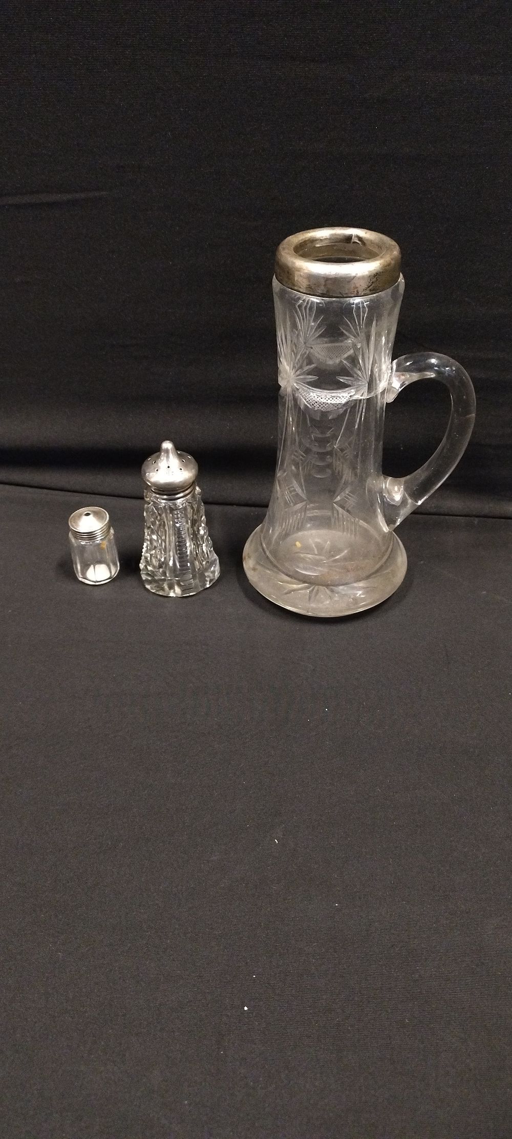 Lot 481: small decanter, pepper pot and salts pot all...