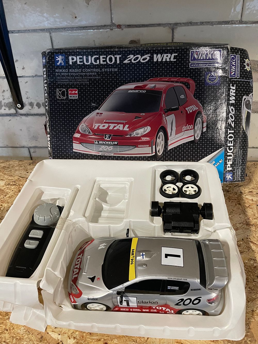 Lot 140: NIKKO Peugeot 206 WRC RC car