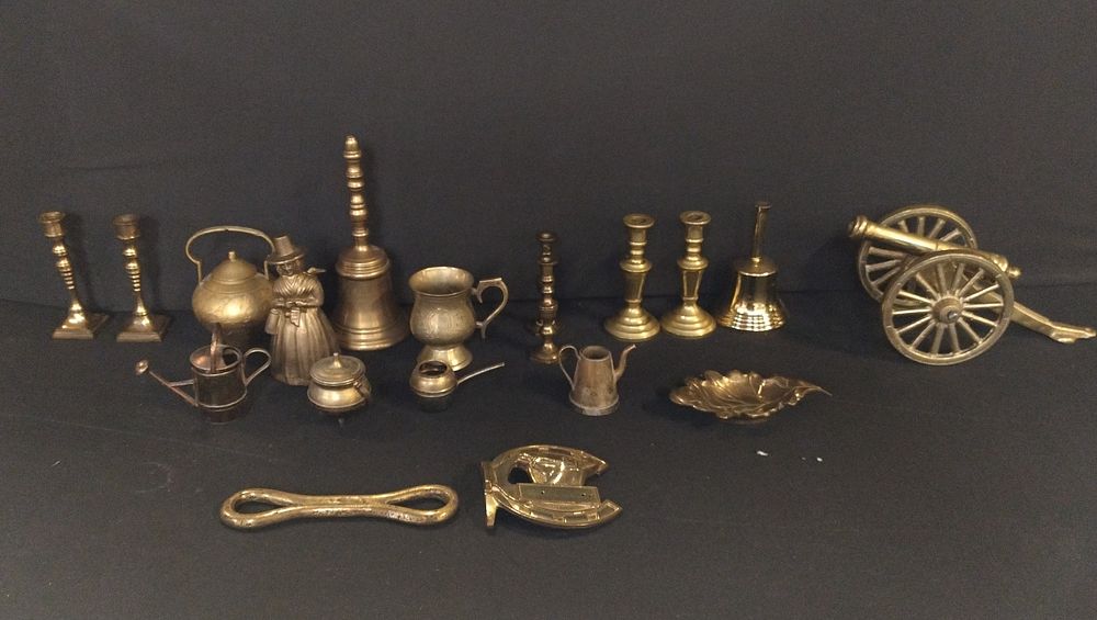 Lot 60: Selection of small brassware including bells, cannon and...