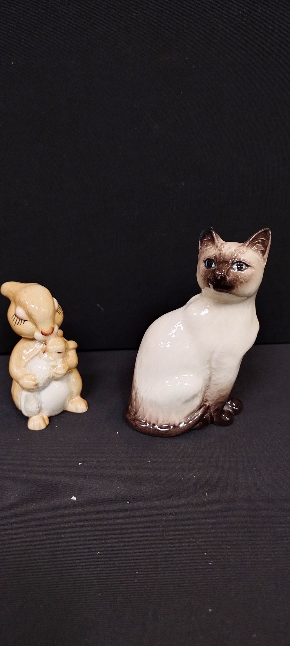 Lot 105: Two Beswick miniature figures one Siamese cat and...