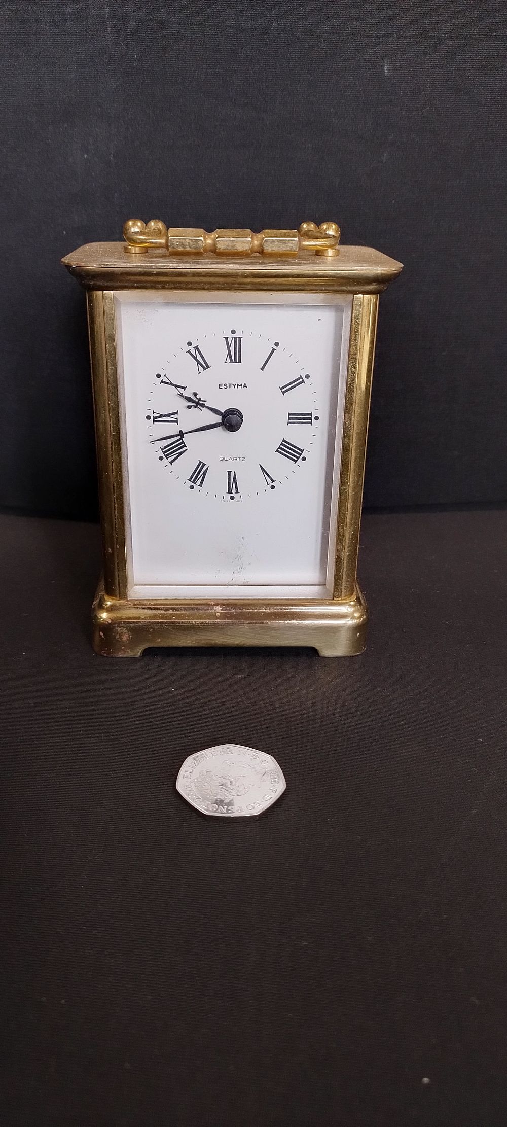 Lot 107: Estyma battery operated carriage clock, measures approx H...