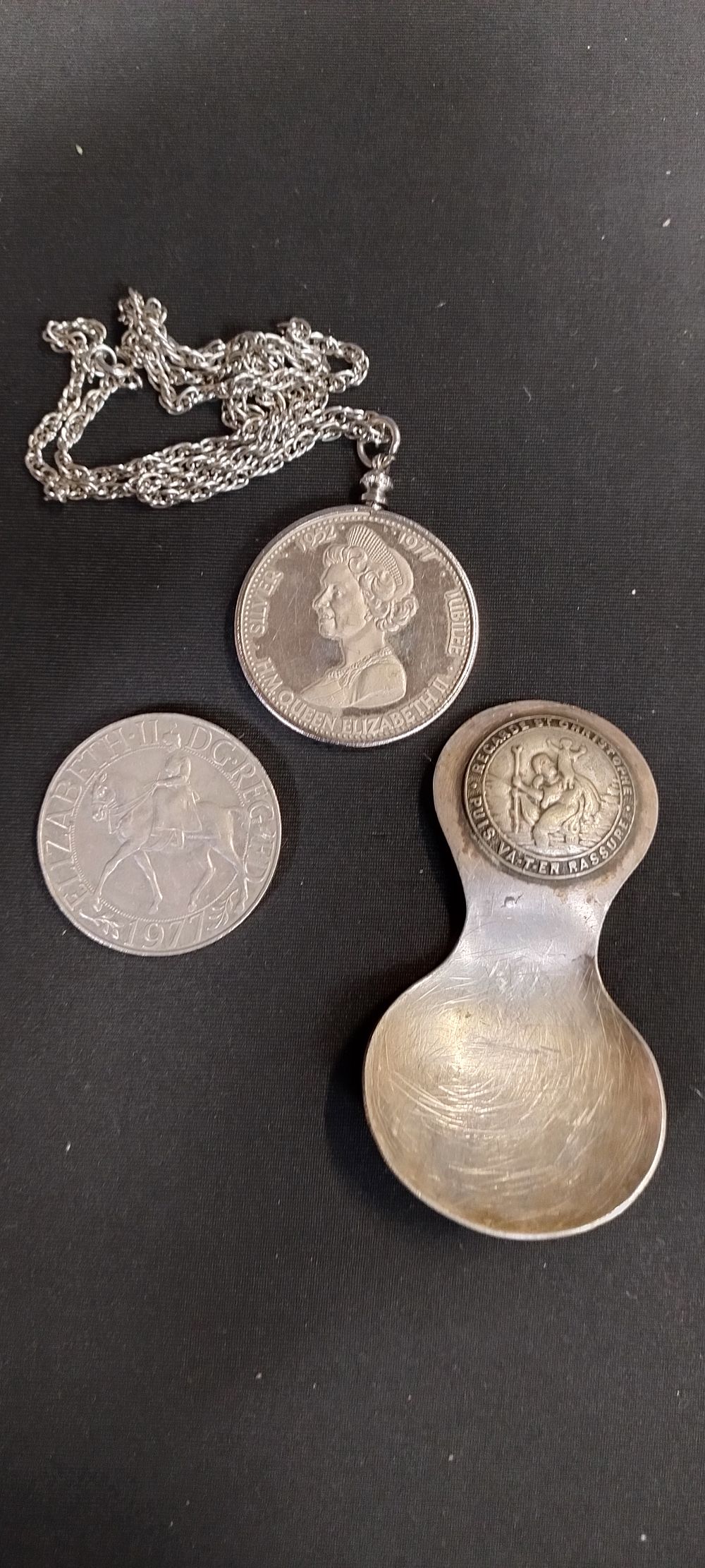 Lot 110: St Christopher christening spoon, silver jubilee mounted coin...
