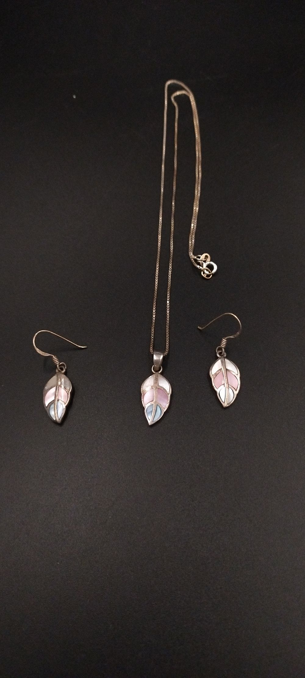 Lot 111: Sterling silver mother of pearl inlaid pendant and...
