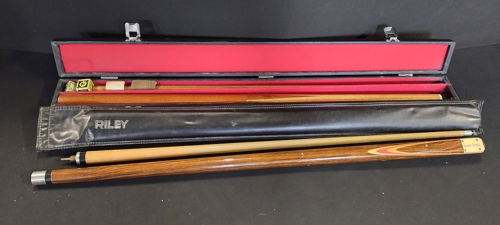 Lot 112: Two Riley pool cues in a Stuart Surridge...