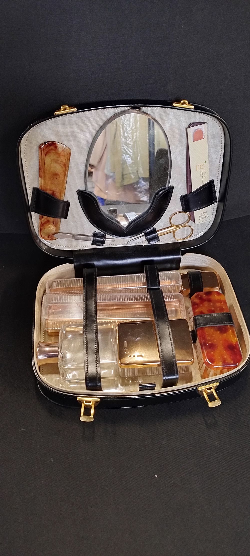 Lot 114: Travel Vanity case containing brush, containers, scissors, and...