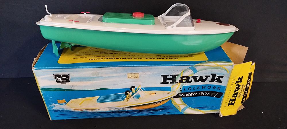 Lot 155: Sutcliffe Model Hawk Clockwork Green and white clockwork...