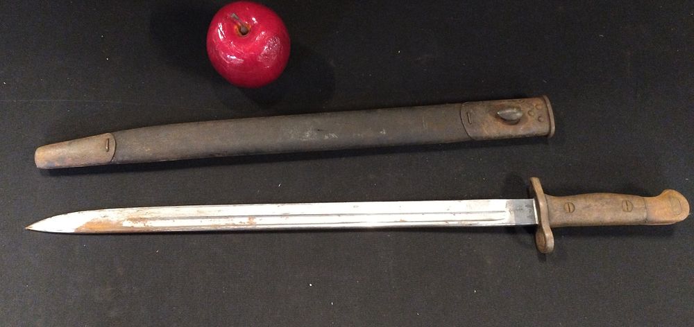 Lot 173: English bayonet and scabbard date marked 1907 with...