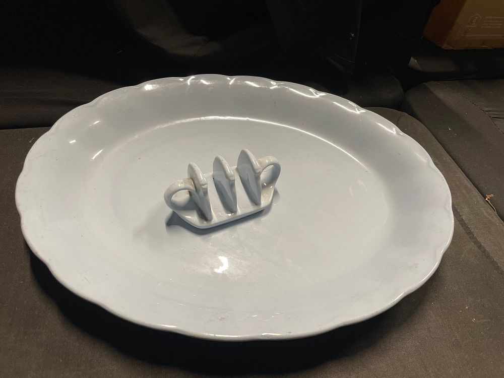 Lot 272: A duck egg blue charger and toastrack