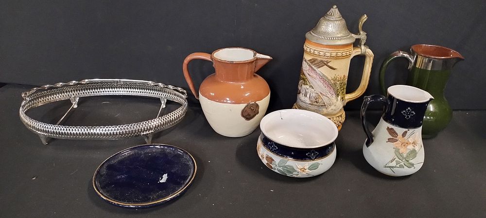 Lot 196: Pottery items including Langley ware, stein with fish...
