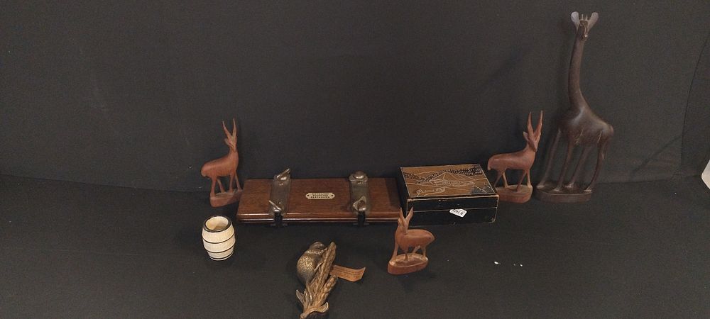 Lot 260: Various animal wood carvings, tie press, and a...