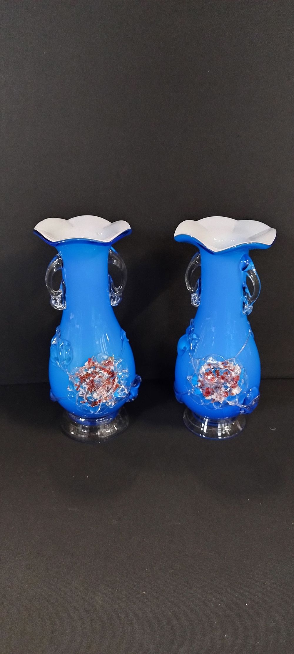 Lot 265: Two blue Venetian hand blown vases. Measures approx...