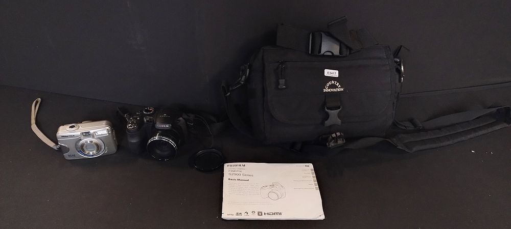 Lot 282: Fujifilm finepix S2950 Digital camera, carry case. And...