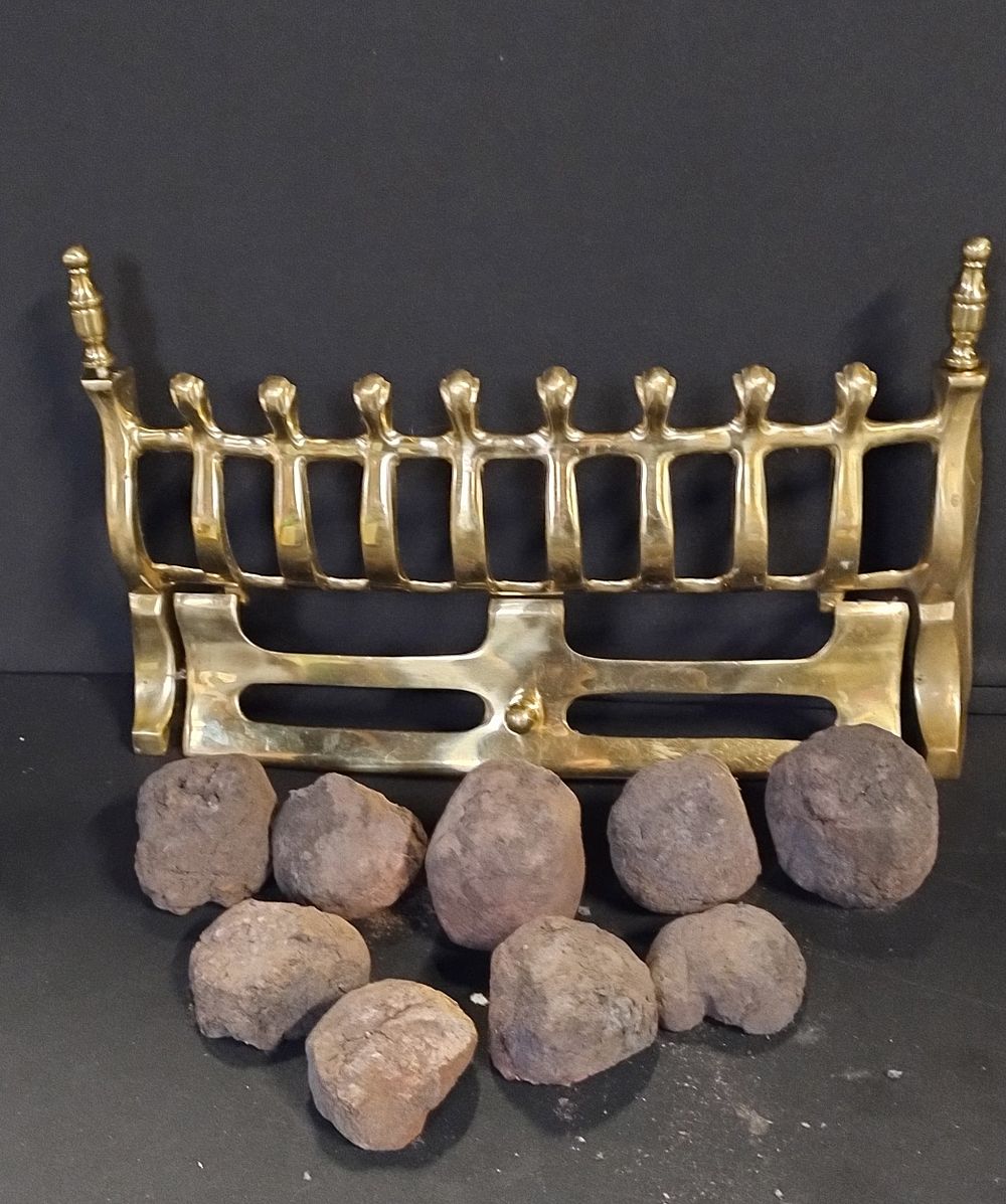 Lot 314: Brass fire grill and coals. Measures approx H...