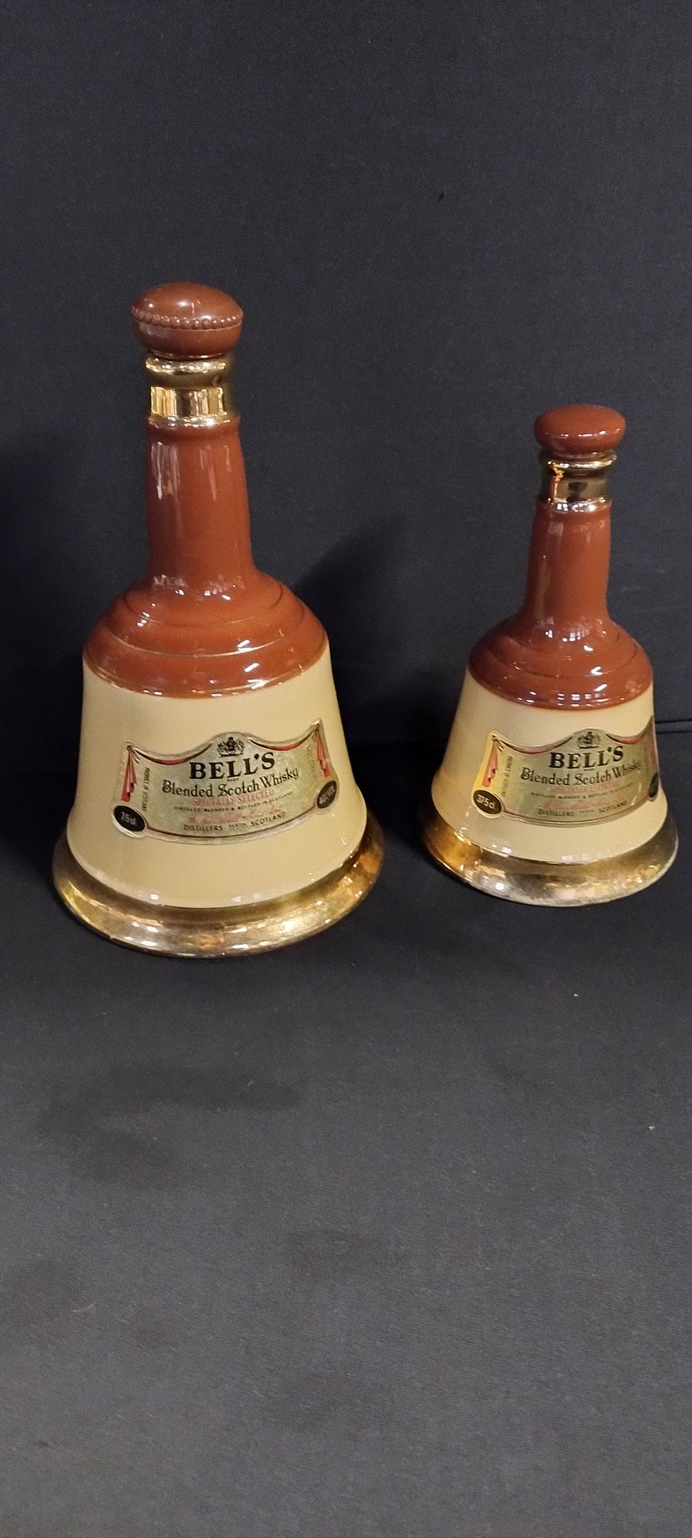 Lot 315: Two wade empty bottles of bells Scotch whisky...