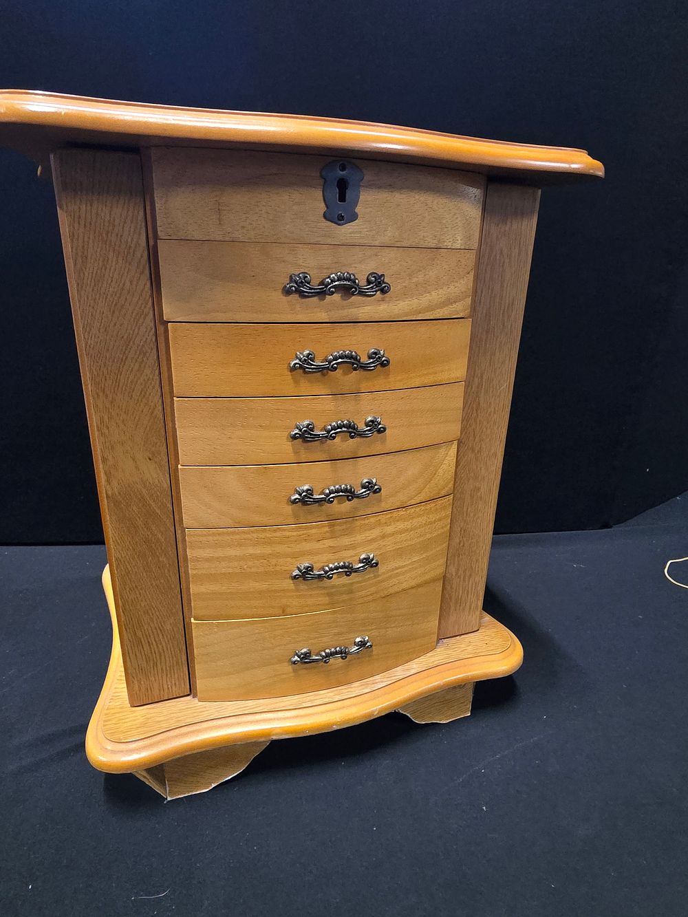 Lot 322: A large vinatge wooden jewellery box, with ring,...