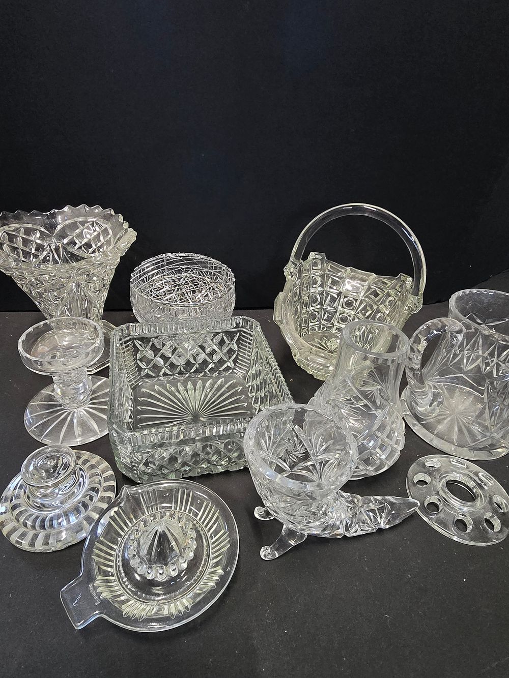 Lot 331: A.selection of lead and cut crystal jugs, Vases...