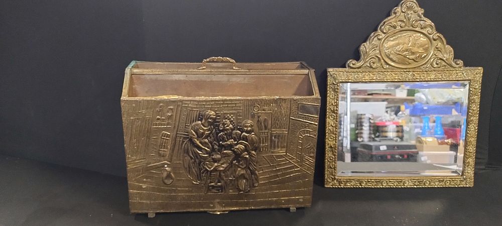 Lot 348: Vintage Brass magazine rack and a brass surround...