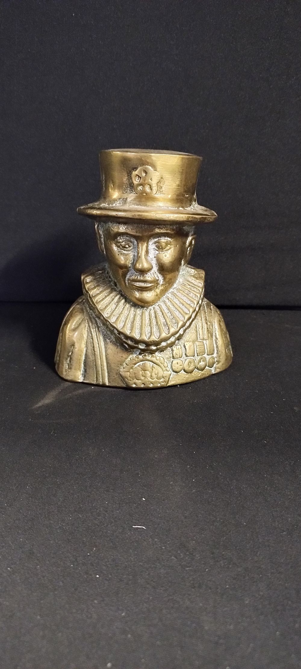 Lot 352: Vintage brass beefeater money box