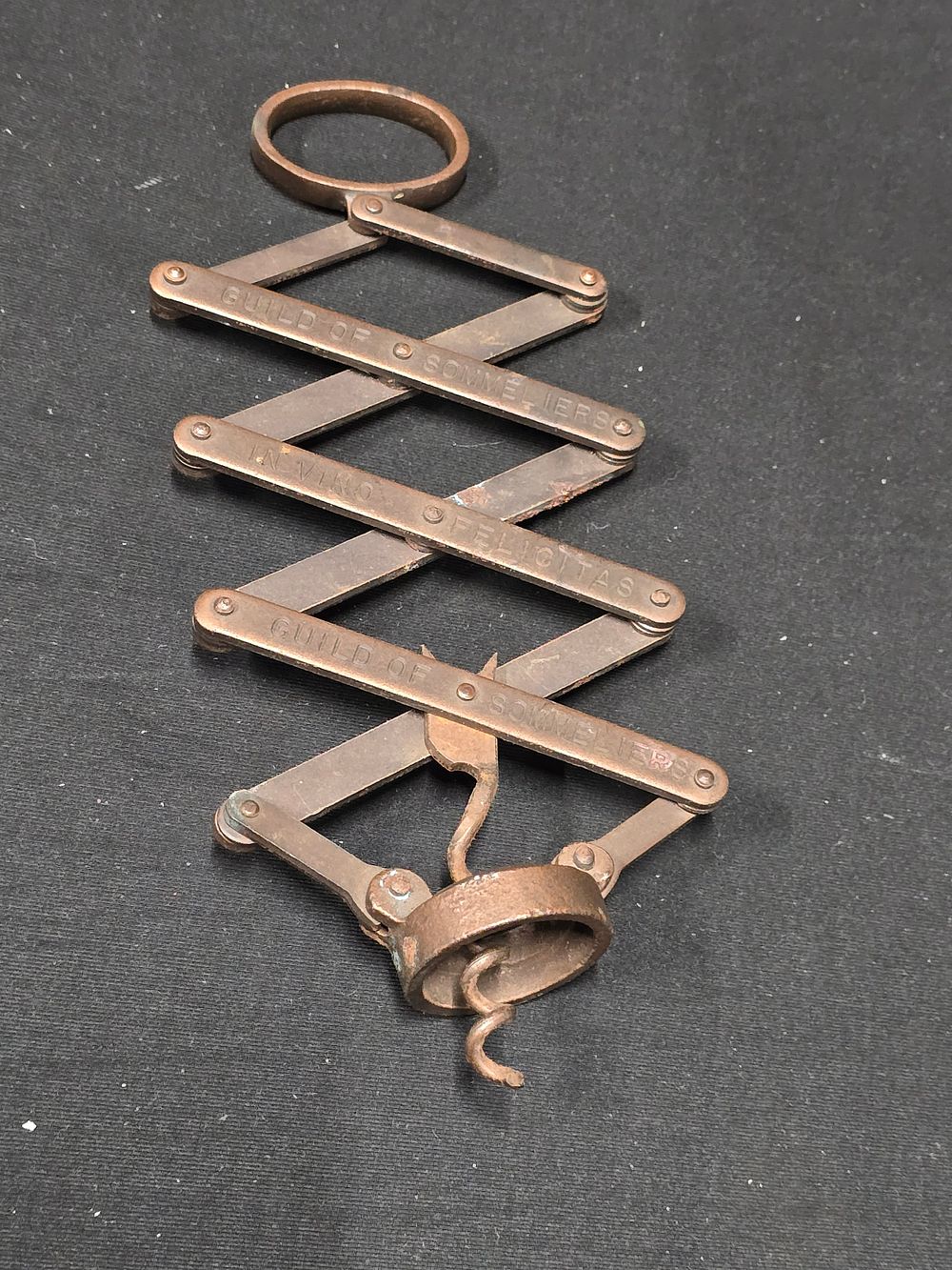 Lot 402: A vintage hand sprung corkscrew