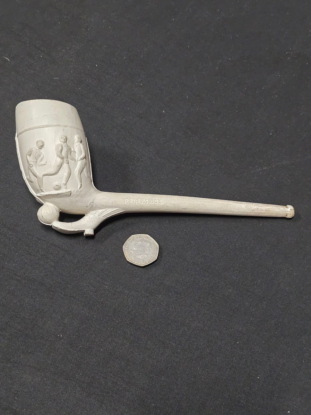 Lot 410: A large hand carved clay pipe